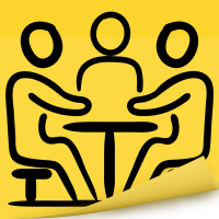 Three People Sitting At A Table